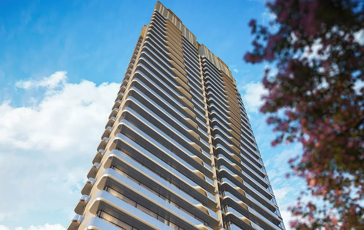 The ELIE SAAB tower elevation rising above the treeline